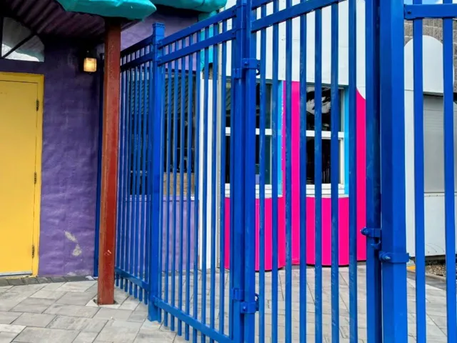 Blue ornamental double swing gate, Calaway Park