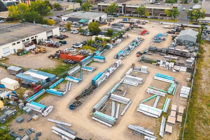 Aerial view of the Phoenix Fence Calgary yard stocked with fence material