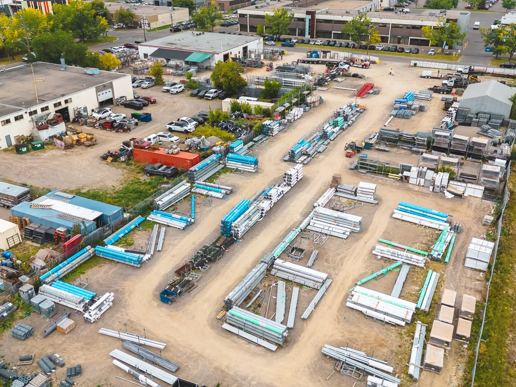 Aerial view of the Phoenix Fence Calgary yard with racks of fence materials