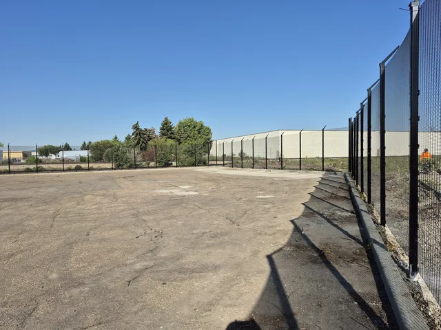 Welded mesh perimeter around the yard, Canplas Industries