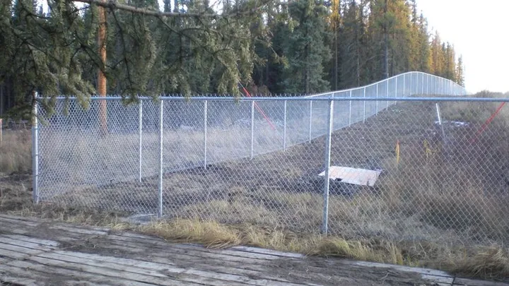 Galvanized industrial chain link fence at a remote site