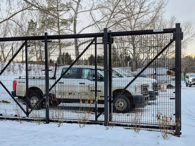 Black welded wire vehicle gate, Hawrelak Park
