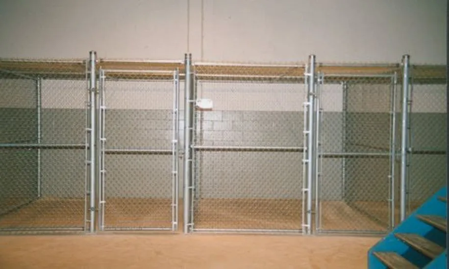 Row of chain link storage lockers with gates