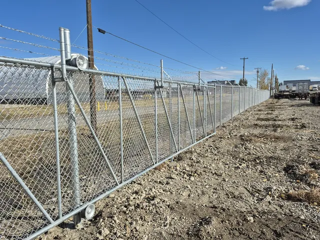 Galvanized cantilever slide gate on rollers, Skyline Trucking
