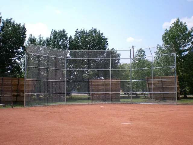 Galvanized backstop with overhang