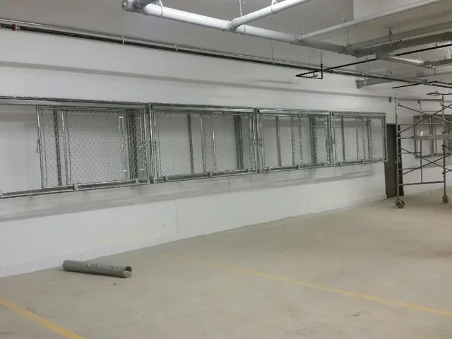 Wall mounted parkade storage cages