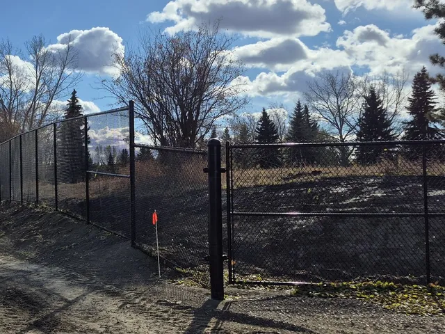 Black chain link double gate, Sturgeon Golf Course