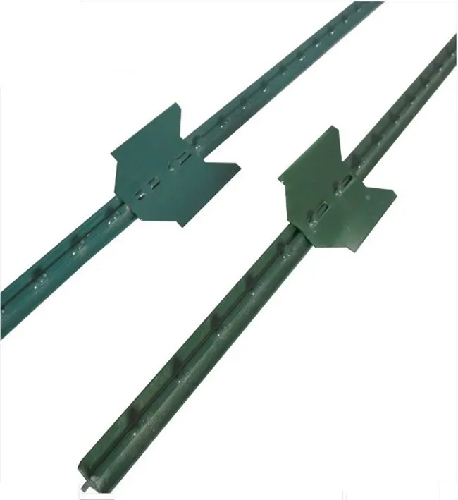 Two studded steel T-bar posts painted green, each with an anchor plate